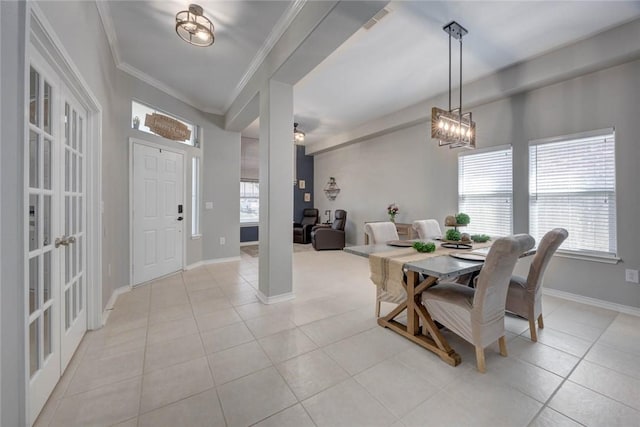 7522 Bell Isle, Corpus Christi, TX 78414 - dining space featuring ornamental molding, light tile patterned floors, and baseboards