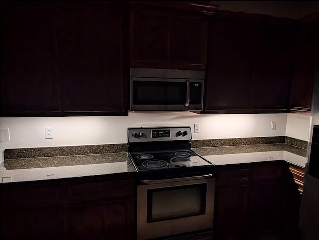 2905 Dante Dr, Corpus Christi, TX 78415 - kitchen featuring appliances with stainless steel finishes and dark countertops