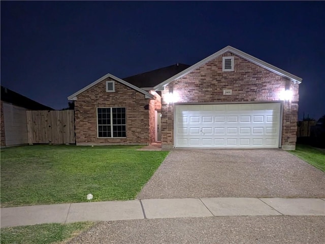 2905 Dante Dr, Corpus Christi, TX 78415 - single story home with brick siding, driveway, a lawn, and an attached garage