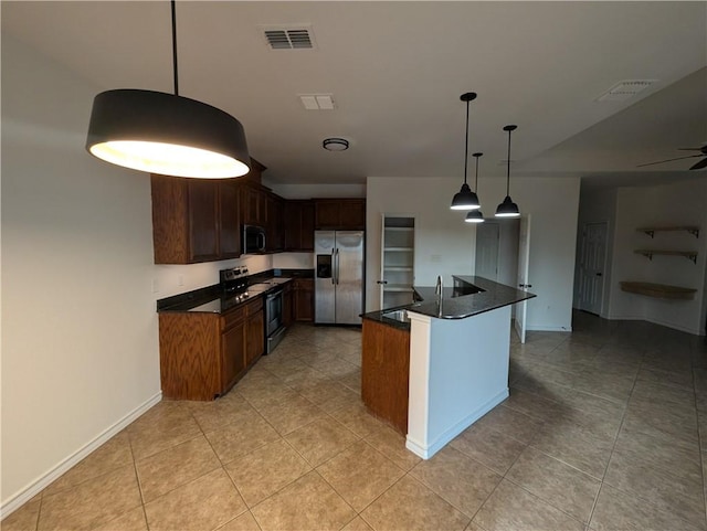 2905 Dante Dr, Corpus Christi, TX 78415 - kitchen with appliances with stainless steel finishes, dark countertops, light tile patterned flooring, and a kitchen island with sink