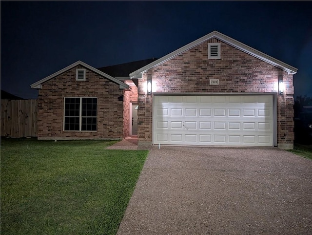 2905 Dante Dr, Corpus Christi, TX 78415 - view of front of property featuring brick siding, driveway, and a garage