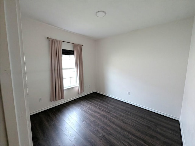 2905 Dante Dr, Corpus Christi, TX 78415 - unfurnished room featuring dark wood-style floors and baseboards