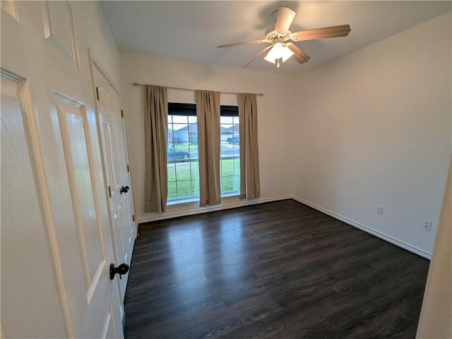 2905 Dante Dr, Corpus Christi, TX 78415 - spare room with dark wood-style floors and ceiling fan