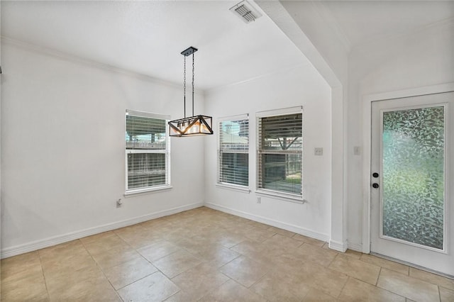 2633 Date Palm Dr, Corpus Christi, TX 78418 - unfurnished dining area featuring a chandelier, baseboards, and light tile patterned floors