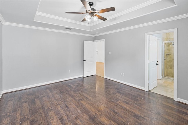 2633 Date Palm Dr, Corpus Christi, TX 78418 - unfurnished bedroom with a tray ceiling, wood finished floors, ornamental molding, baseboards, and ceiling fan