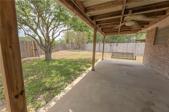 3814 Whitney Dr, Corpus Christi, TX 78410 - fenced backyard featuring ceiling fan and a patio area