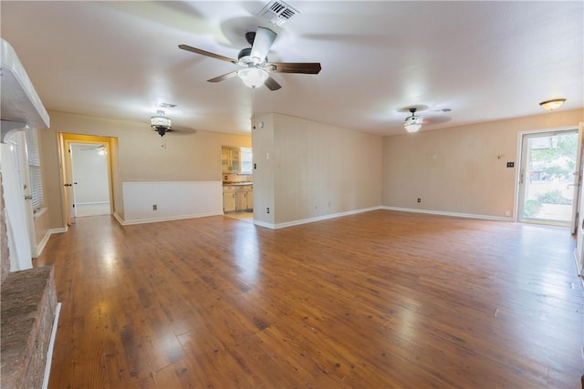 3814 Whitney Dr, Corpus Christi, TX 78410 - unfurnished living room with ceiling fan and wood finished floors