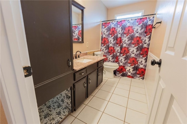3814 Whitney Dr, Corpus Christi, TX 78410 - full bath with tile patterned flooring, vanity, and a shower with shower curtain