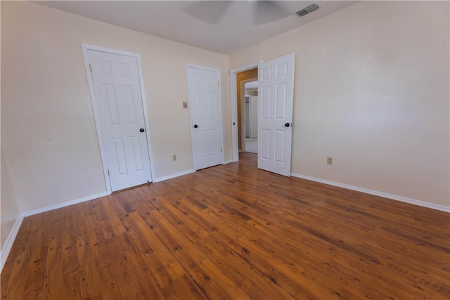 3814 Whitney Dr, Corpus Christi, TX 78410 - unfurnished bedroom with baseboards and wood finished floors