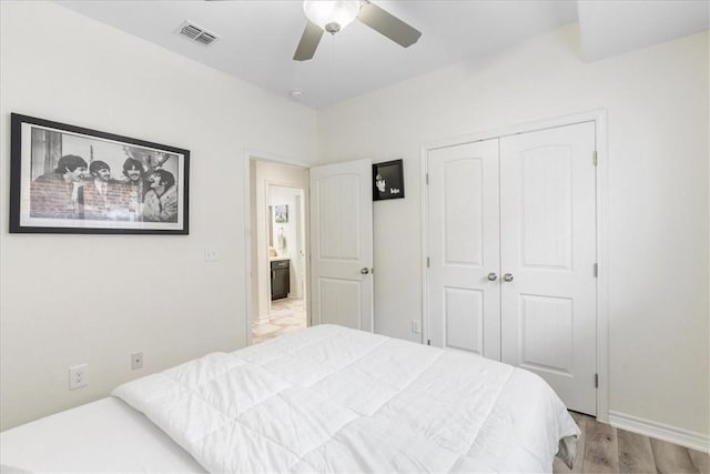 8129 Resplandor St, Corpus Christi, TX 78414 - bedroom featuring a closet, wood finished floors, a ceiling fan, and baseboards