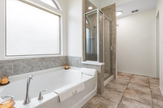 8129 Resplandor St, Corpus Christi, TX 78414 - full bathroom featuring a stall shower and a garden tub