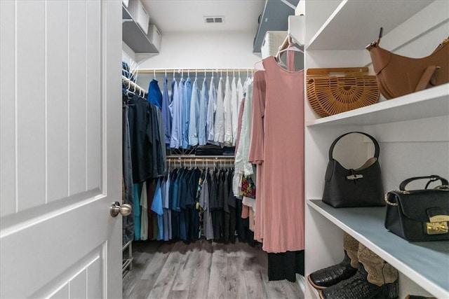 8129 Resplandor St, Corpus Christi, TX 78414 - spacious closet featuring wood finished floors