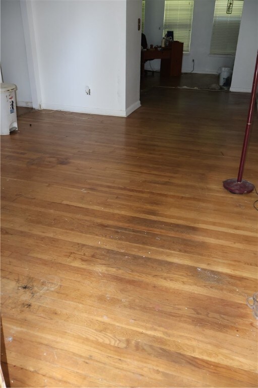 empty room featuring hardwood / wood-style floors