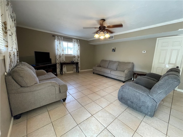 tiled living room featuring ceiling fan and ornamental molding