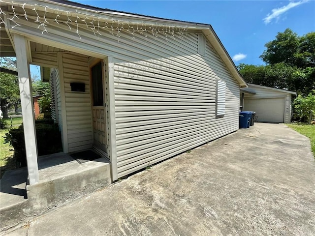 view of property exterior featuring a garage