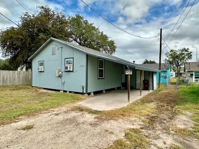 exterior space featuring a carport