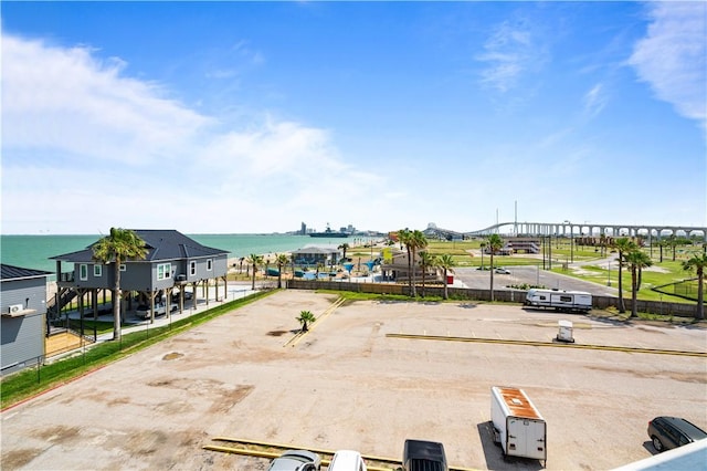 3938 Surfside Blvd Unit 1316, Corpus Christi, TX 78402 - view of property's community featuring a water view and uncovered parking