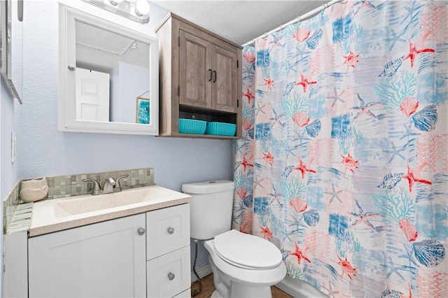 3938 Surfside Blvd Unit 1316, Corpus Christi, TX 78402 - full bathroom with vanity, toilet, and curtained shower