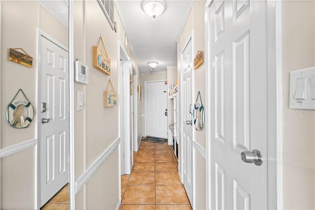 3938 Surfside Blvd Unit 1316, Corpus Christi, TX 78402 - hall with light tile patterned floors and a textured ceiling