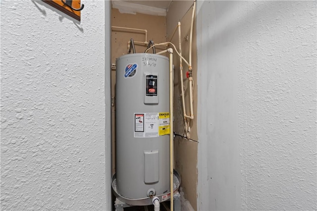 utility room with water heater