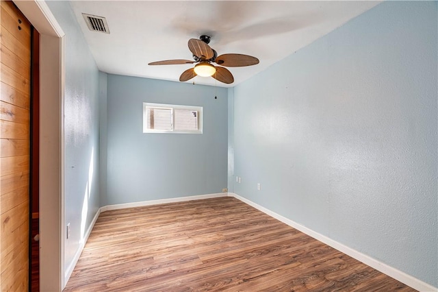 unfurnished room with light hardwood / wood-style flooring and ceiling fan