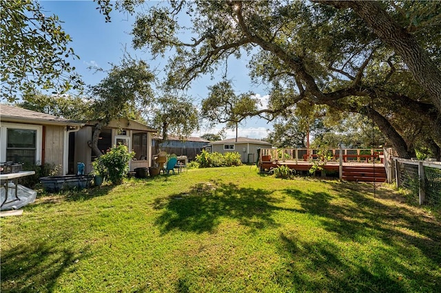 177 Grapevine Dr, Rockport, TX 78382 - view of yard featuring a wooden deck