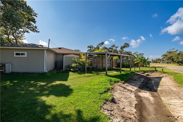 view of yard with a storage shed