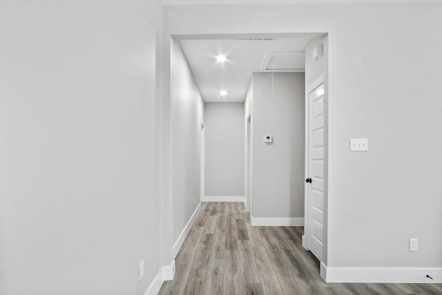 hall featuring light hardwood / wood-style floors