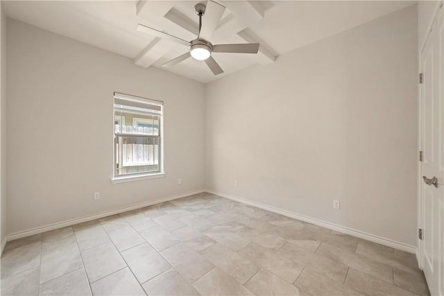 empty room with beam ceiling, baseboards, and ceiling fan