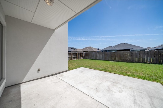 view of patio with a fenced backyard