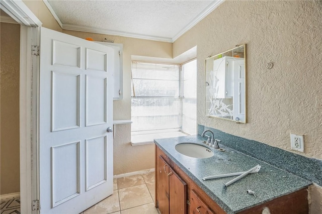 bathroom featuring plenty of natural light, ornamental molding, a textured ceiling, and a textured wall