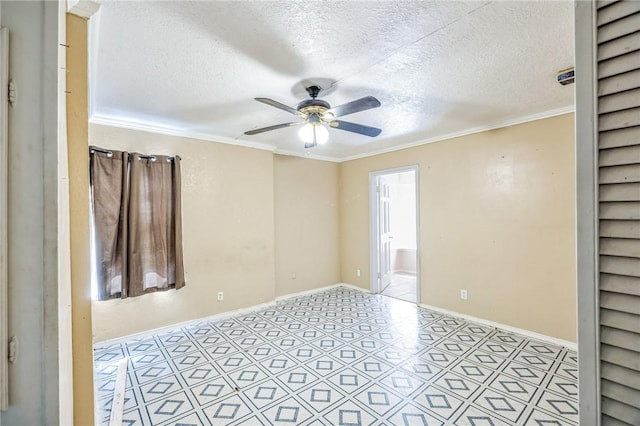 empty room with ceiling fan, ornamental molding, a textured ceiling, and baseboards