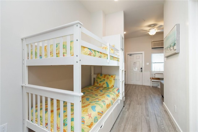 bedroom with wood finished floors