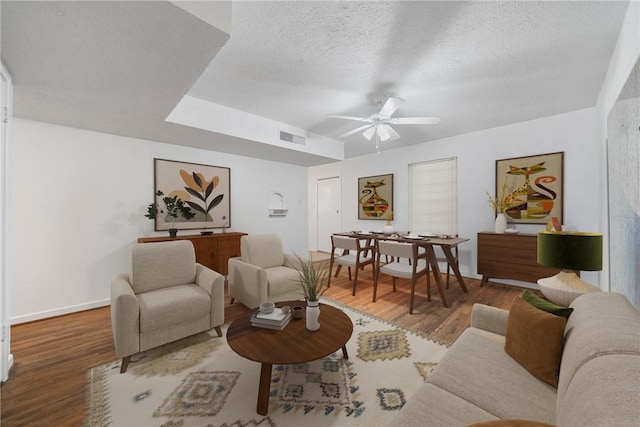 4613 Marks Dr, Corpus Christi, TX 78411 - living room with ceiling fan, wood finished floors, and a textured ceiling