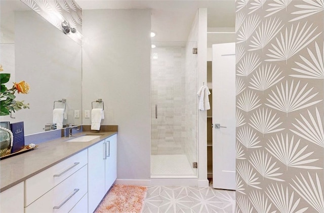 bathroom with vanity, tile patterned floors, and an enclosed shower