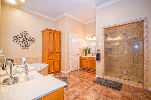 bathroom featuring vanity, crown molding, and shower with separate bathtub