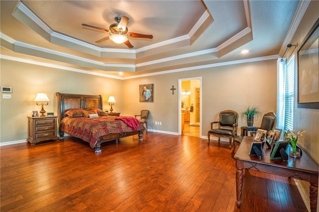 bedroom featuring ceiling fan, crown molding, and a raised ceiling