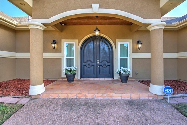 property entrance featuring french doors