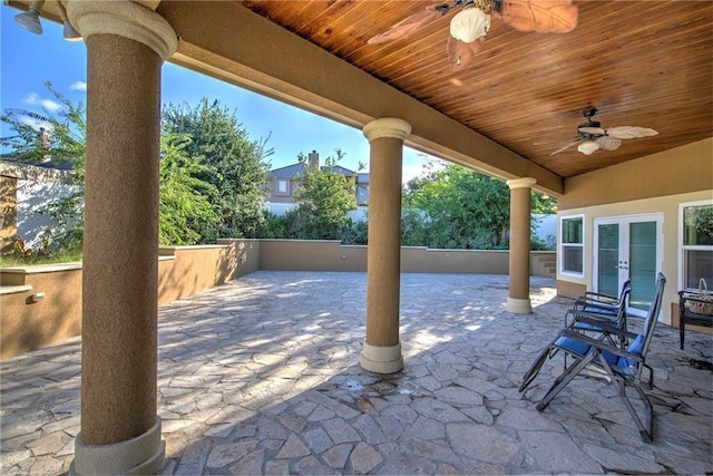 view of patio featuring ceiling fan