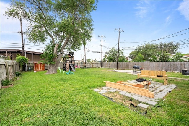 view of yard with a playground