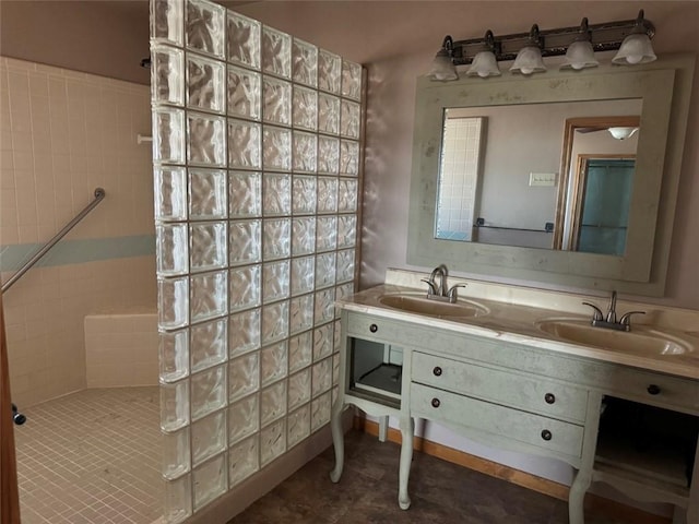 bathroom featuring tile patterned flooring and vanity