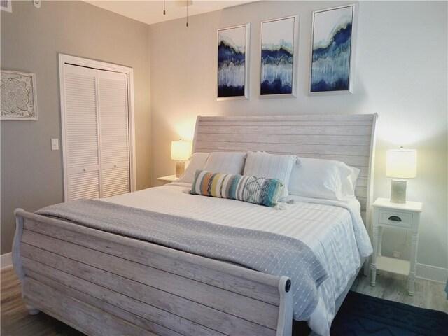 14802 Whitecap Blvd Unit 3-106, Corpus Christi, TX 78418 - bedroom featuring a closet and wood finished floors