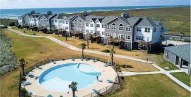 14802 Whitecap Blvd Unit 3-106, Corpus Christi, TX 78418 - aerial perspective of suburban area featuring a pool