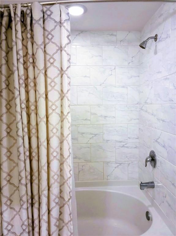 14802 Whitecap Blvd Unit 3-106, Corpus Christi, TX 78418 - full bathroom with shower / tub combo