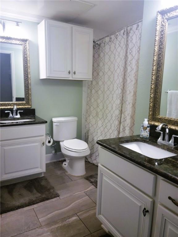 14802 Whitecap Blvd Unit 3-106, Corpus Christi, TX 78418 - bathroom with vanity and toilet