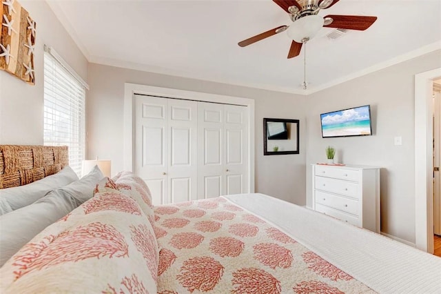 3 Mazatlan Dr, Rockport, TX 78382 - bedroom with a closet, ceiling fan, and wood finished floors