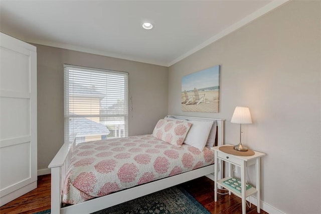 3 Mazatlan Dr, Rockport, TX 78382 - bedroom with dark wood finished floors, baseboards, crown molding, and recessed lighting