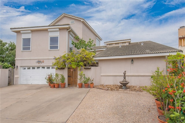 view of side of home with a garage