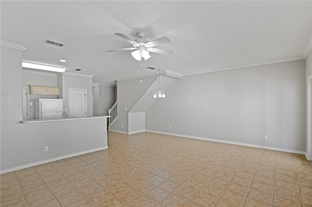 unfurnished room with ceiling fan and ornamental molding