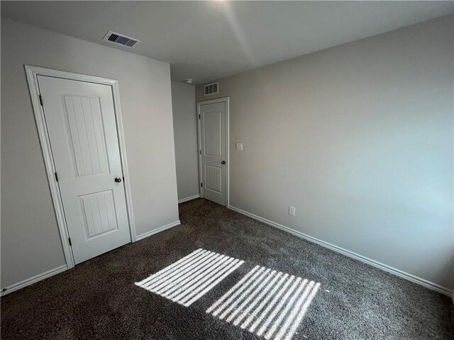 7302 Wilder Ln, Corpus Christi, TX 78414 - unfurnished bedroom featuring carpet and baseboards